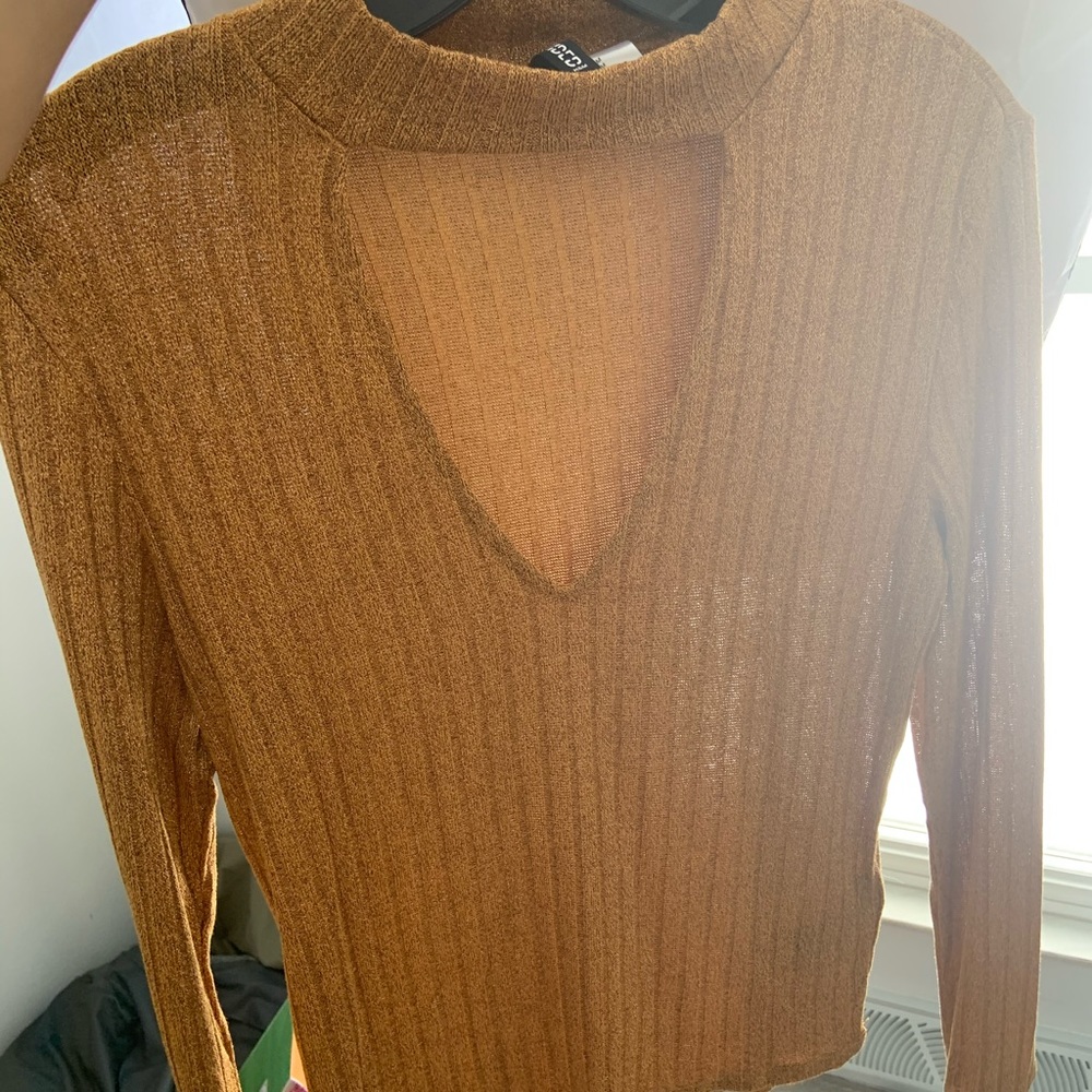 long sleeve, open in the front.